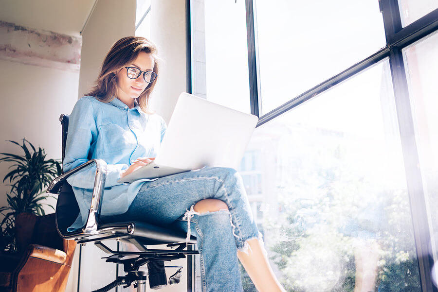 new-window-research-young-female-on-laptop