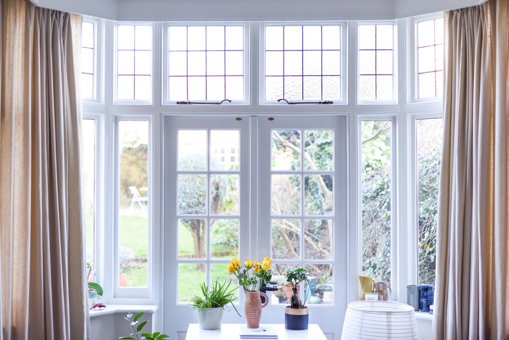 Stylish-Room-Interior-With-French-Doors-and-Light-Neutral-Colors-in-a-Modern-Home